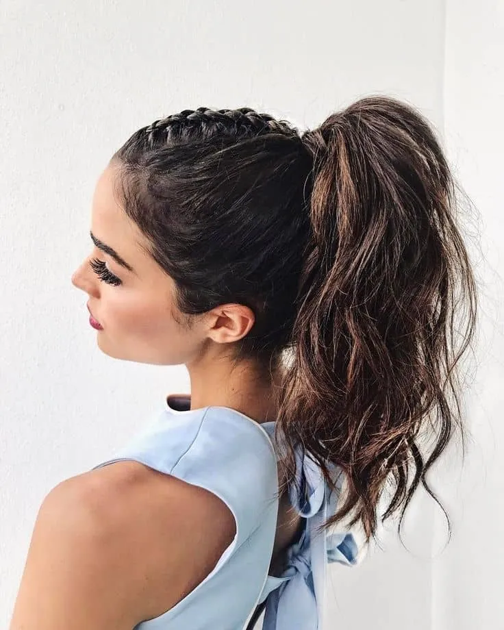 Woman in sky blue cut sleeves dress and The Edgy Pony hairstyle Woman in sky blue cut sleeves dress and The Edgy Pony hairstyle - ladies hairstyle 2022