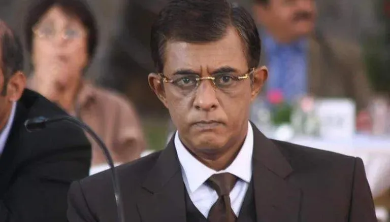 Shiv Kumar Subramaniam in grey suit with matching tie and white shirt Shiv Kumar Subramaniam in grey suit with matching tie and white shirt - recent celebrity deaths 2022 list