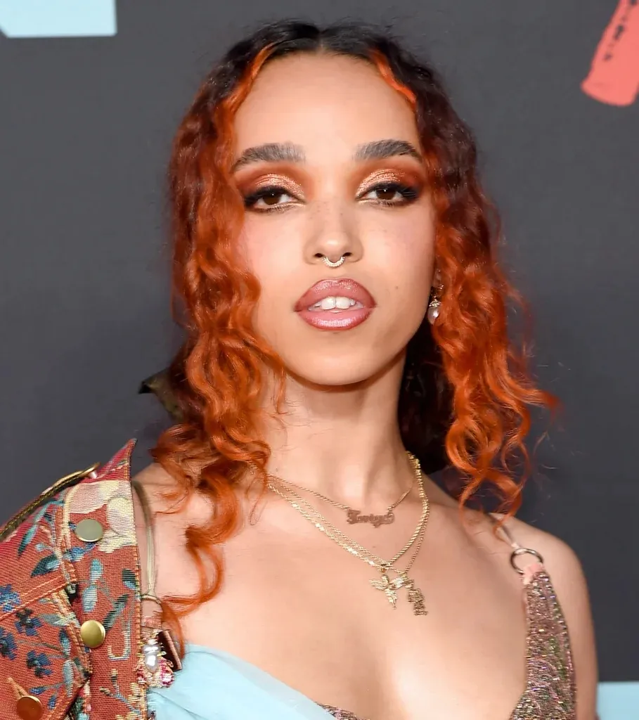 A women in golden strappy dress with jacket posing for camera and showing her Flaming Copper hair color A women in golden strappy dress with jacket posing for camera and showing her Flaming Copper hair color - red hair color 2022