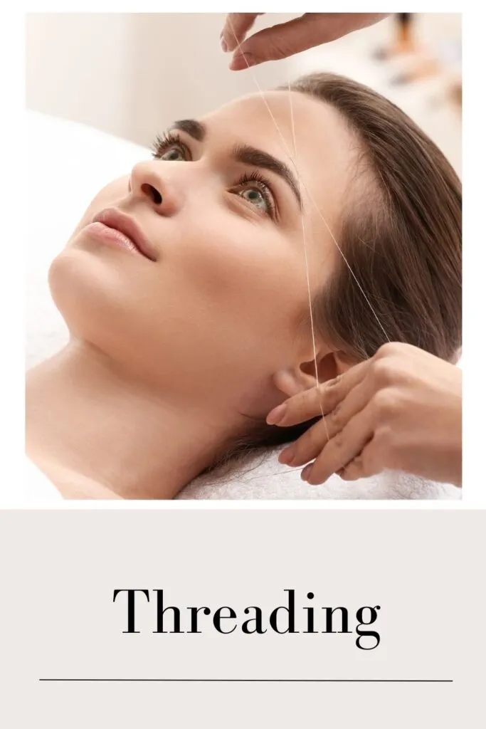 A lady is setting her eyebrows with threading A lady is setting her eyebrows with threading - dry skin