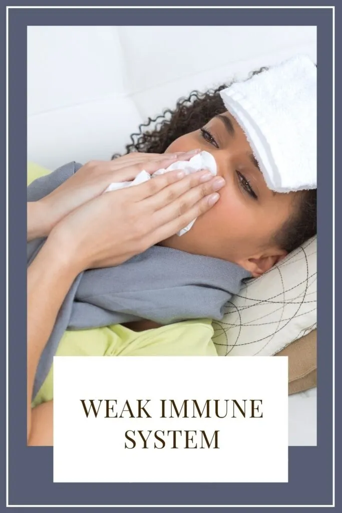 A girl suffering from cold and fever A girl suffering from cold and fever - Immune System