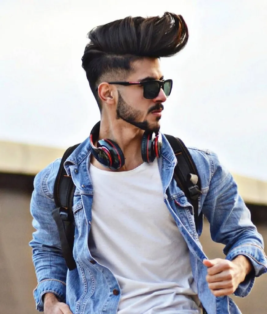 Man in denim jacket with white t-shirt and goggles and messy Quiff Hairstyle Man in denim jacket with white t-shirt and goggles and messy Quiff Hairstyle - best hairstyle for Indian boy