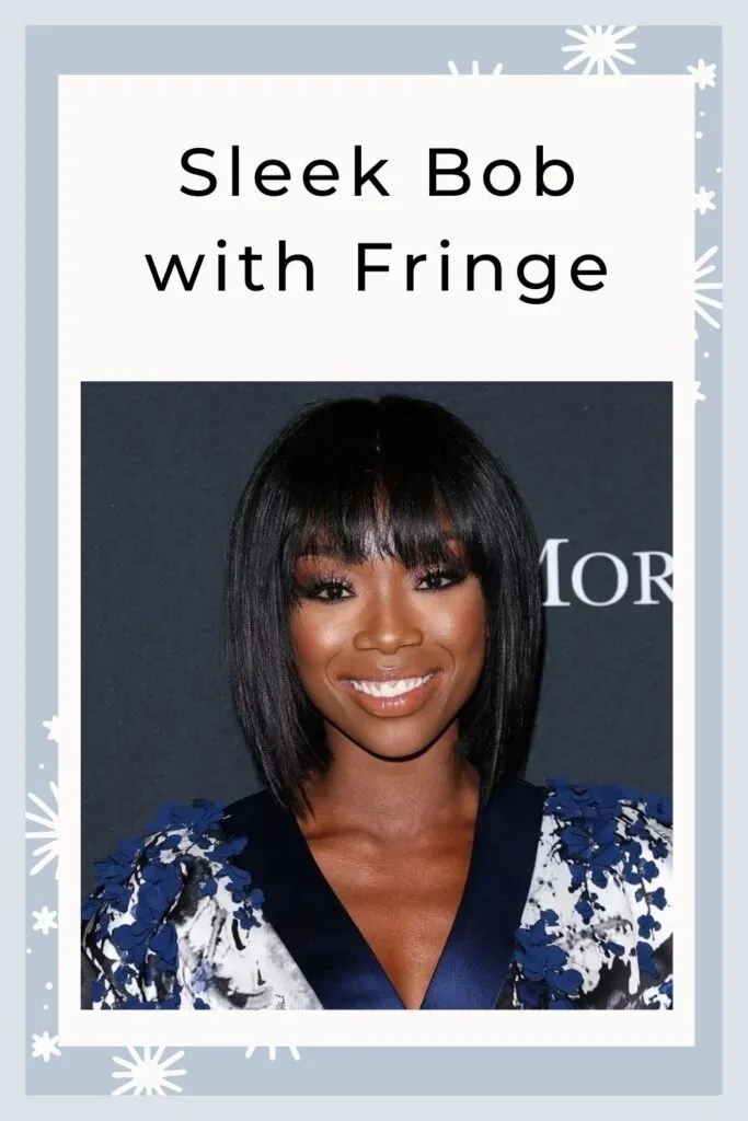 A girl in blue and white top showing her Sleek Bob with fringe A girl in blue and white top showing her Sleek Bob with fringe - ponytail hairstyles