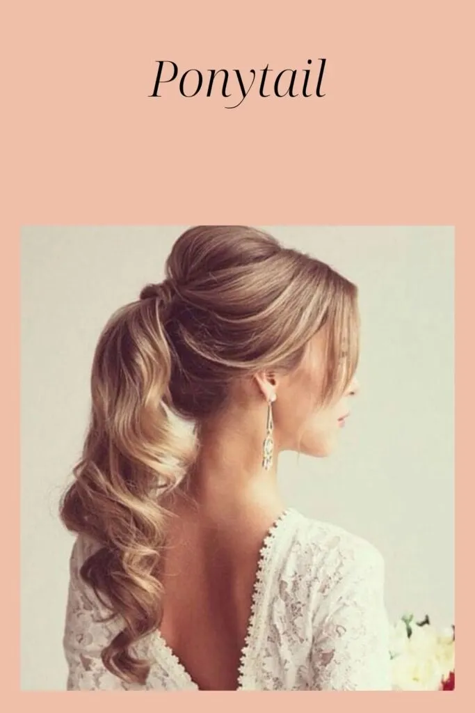 A women in off white deep neck top showing then back view of her ponytail A women in off white deep neck top showing then back view of her ponytail - latest hairstyles for Indian Women