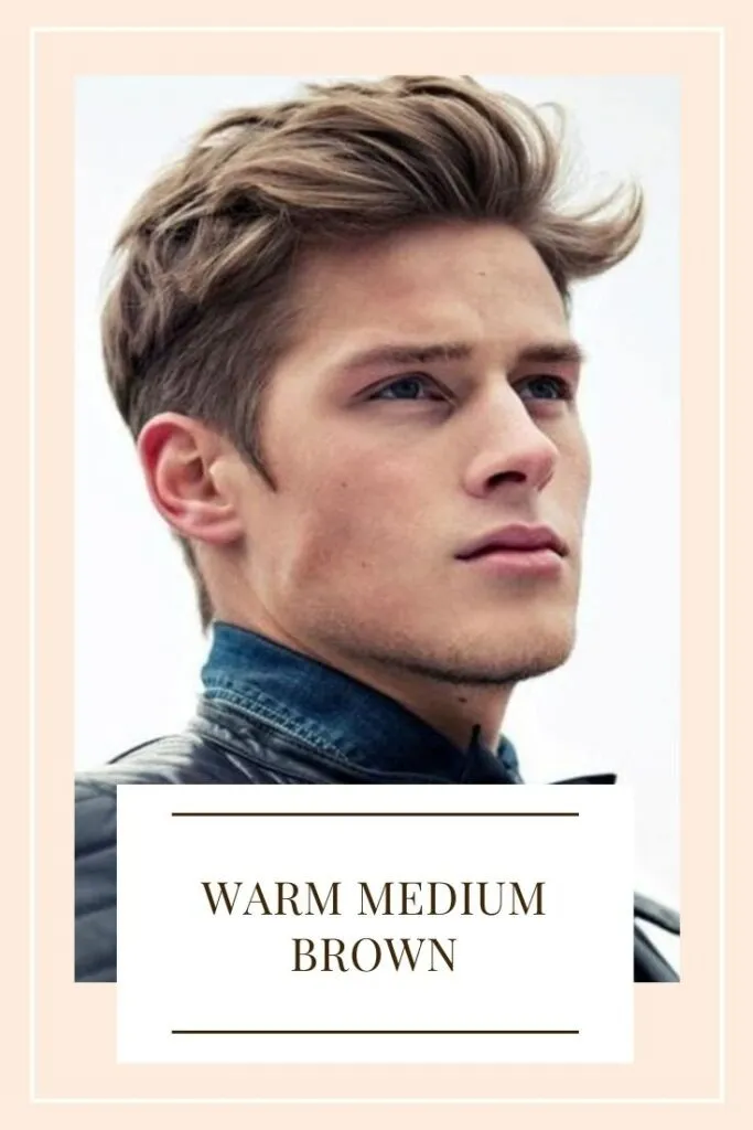 A boy in blue denim showing his warm medium brown hair color A boy in blue denim showing his warm medium brown hair color - trending hair color for men