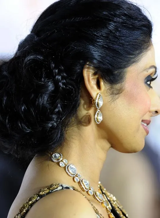 Sridevi in stone necklace with matching earrings and textured bun Sridevi in stone necklace with matching earrings and textured bun - bollywood actresses hairstyles
