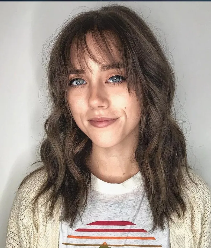 Woman in white and multi color lining t-shirt Wispy Bangs Hair Woman in white and multi color lining t-shirt Wispy Bangs Hair - hairstyles for women