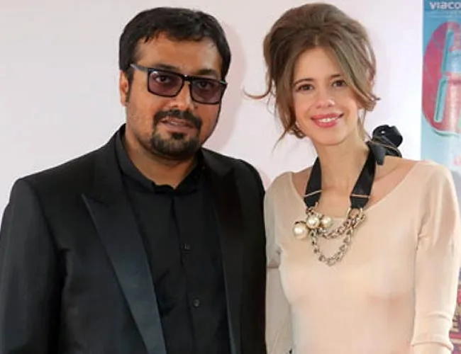 Anurag Kashyap in black suit and Kalki Koechlin in pink dress smiling Anurag Kashyap in black suit and Kalki Koechlin in pink dress smiling - bollywood actress divorced in 2021