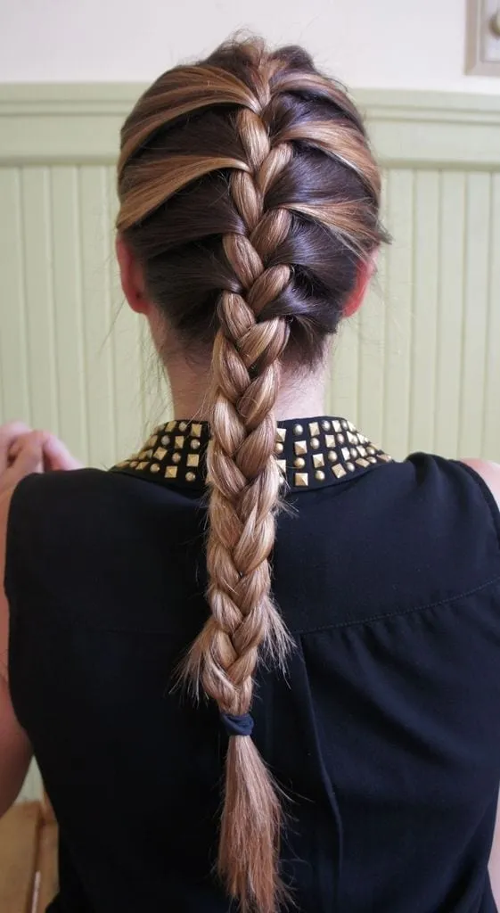 Woman in black cut sleeves dress and Braids hairstyle Woman in black cut sleeves dress and Braids hairstyle - latest women hairstyle