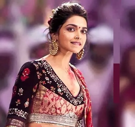 Deepika Padukone in black and red lehenga with danglers Deepika Padukone in black and red lehenga with danglers - Deepika Padukone Hairstyles