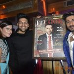 Guru randhawa launched a fitness magazine - he is with a co founders of magazine - 3 people is in this picture. Guru Randhawa wore black attires.