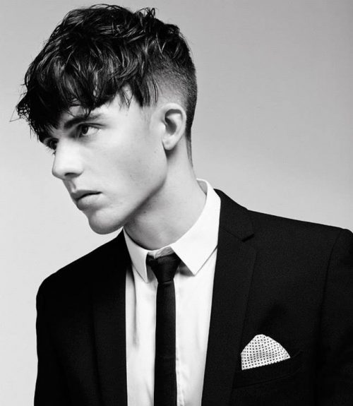 man in black coat with white shirt and tie with Angular Fringe hairstyle - haircuts for men fade