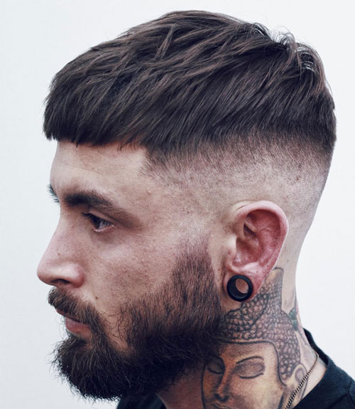 man in black t-shirt and Short French Crop hairstyle - haircuts for men fade