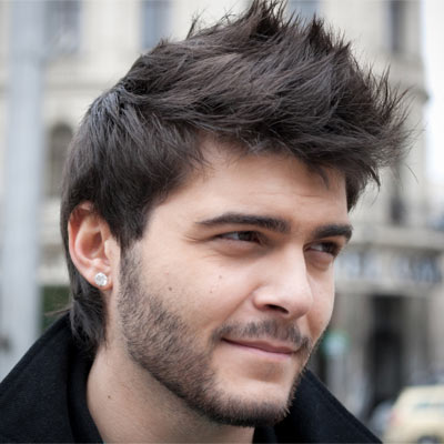 man in black jacket and Tall Spike hairstyle - mens haircuts list