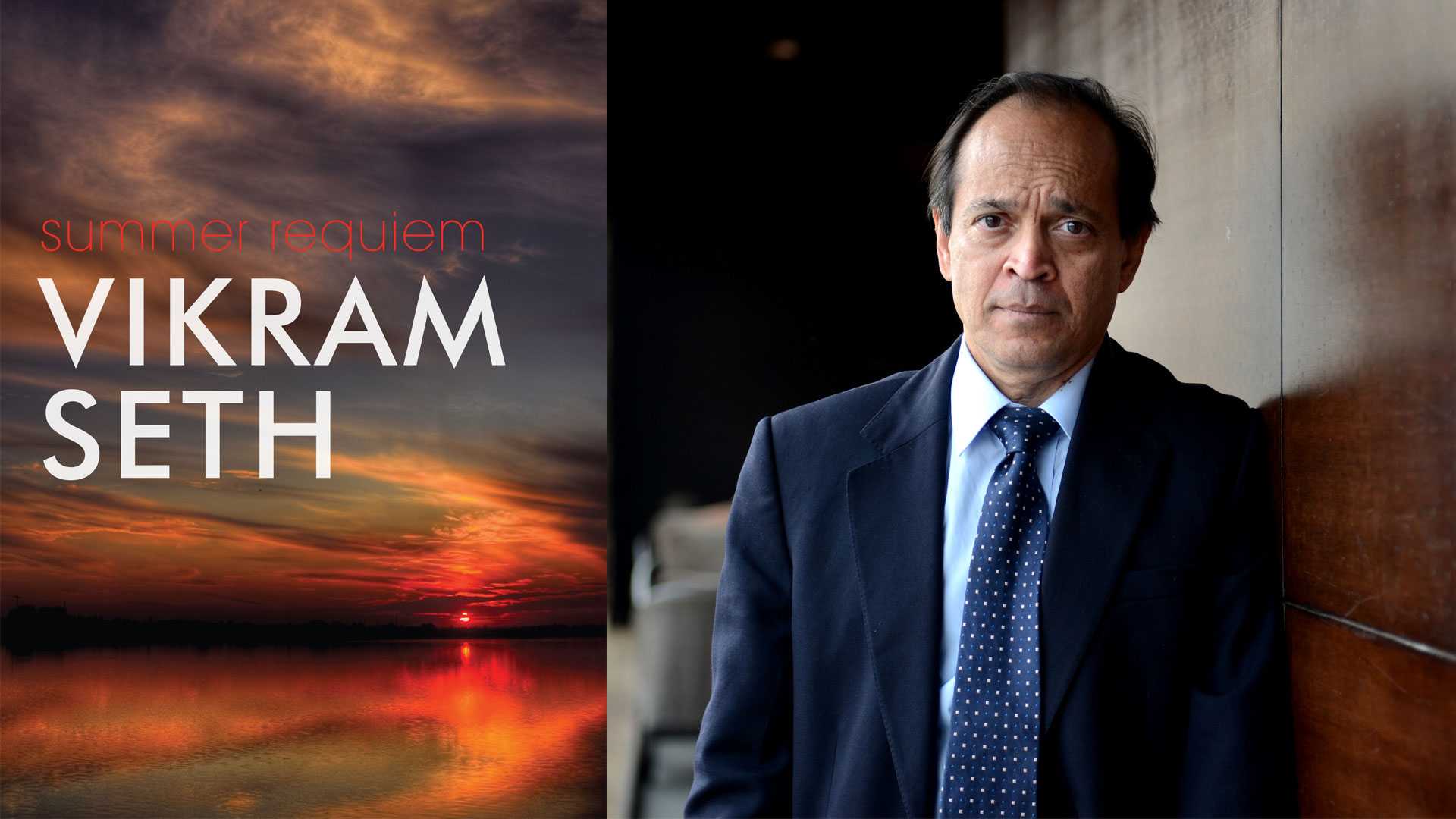 Vikram Seth standing in blue suit - gay fashion designers india