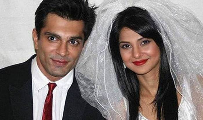 Karan Singh Grover and Jennifer Winget smiling in their wedding outfit - bollywood actress divorced