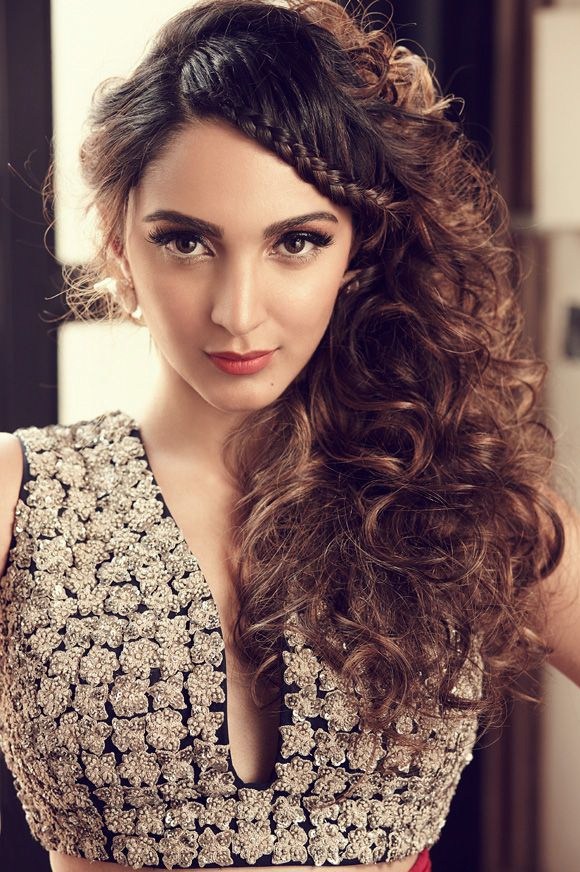 Kiara Advani in black and golden cut sleeves dress posing for camera - Most Beautiful Indian Girl