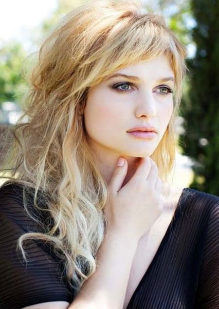 Woman in black dress with Layered Bedhead hairstyle - hair cut for girls