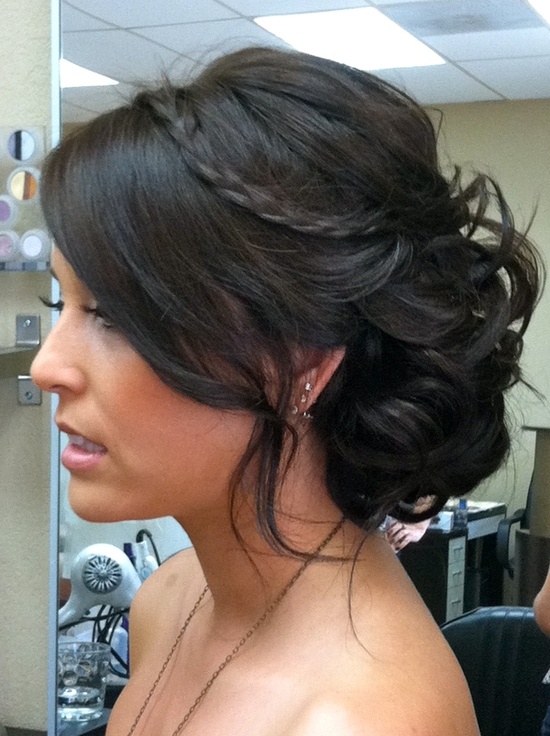 A girl in off shoulder dress showing the side view of her Messy Side Bun - bun hairstyles