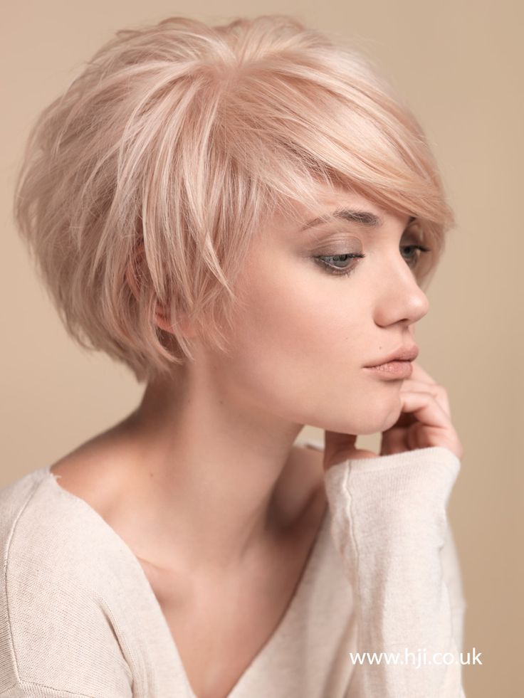 woman in off white dress with Short Crop Hairstyle - best simple hairstyles