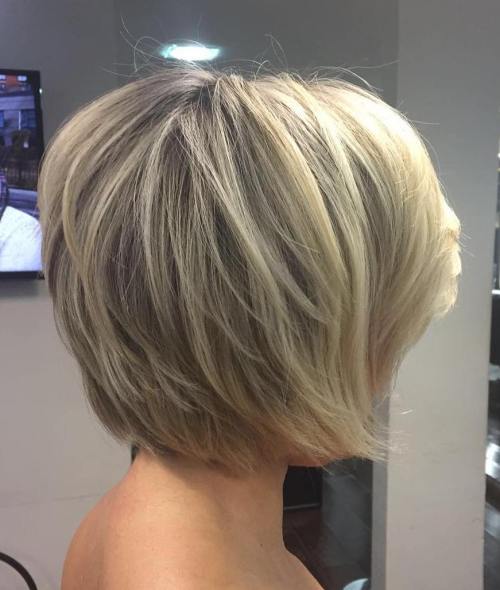 Woman in tube top showing the side view of her Short Layered Bob Hairstyle - simple hairstyles for short hair