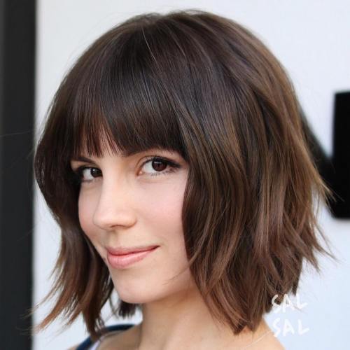 Smiling woman in Straight Bob with Bangs Hairstyle - simple hairstyles for ladies