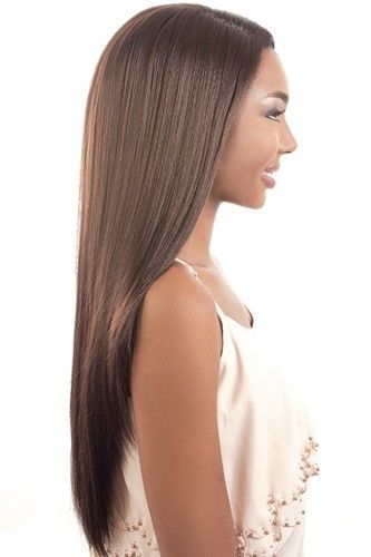 Woman in peach strappy dress with Straight Tress - hair cut for girls long hair