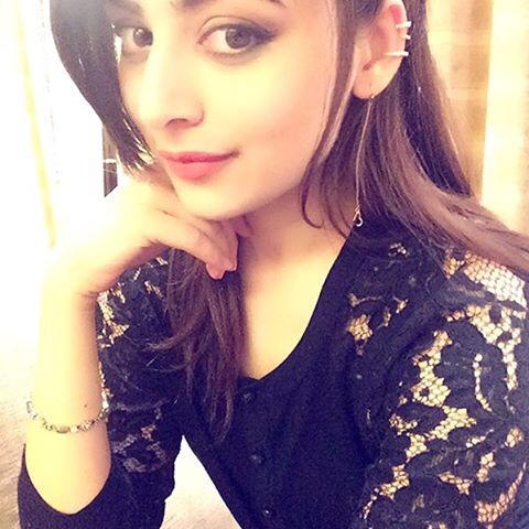 Zoya Afroz in black net top posing for a selfie - most beautiful Indian girl
