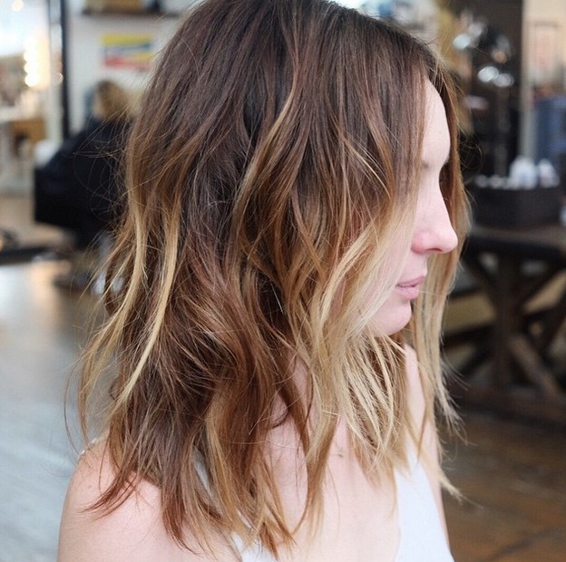 Woman in white tank top and Choppy Balyage - haircuts for long hair