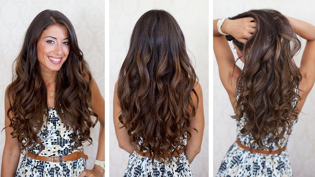 Woman in multicolor printed dress showing her Straight Curls Long Hair - hairstyles for girls with long hair