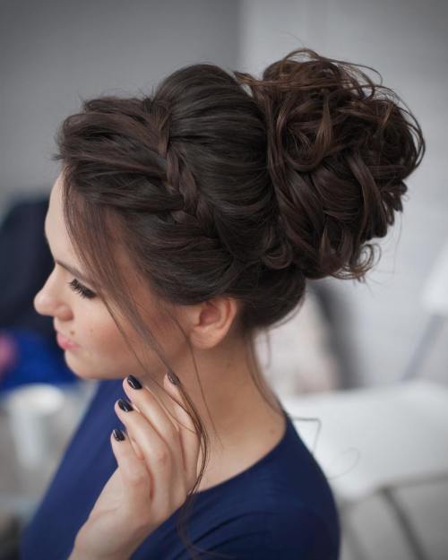 A girl in blue dress and black nail paint showing the side view of her Prom Ready Updo - haircut Teenage Girls