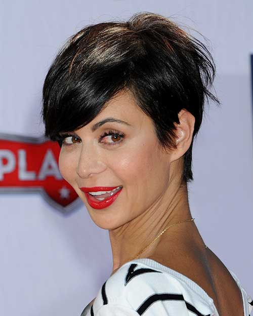 A girl in black and white lining top with red lipstick showing the side view of her Tight Brunette Pixie - Girls haircut