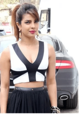 Priyanka Chopra in white and black crop top and skirt - Priyanka Chopra Hairstyles Popular