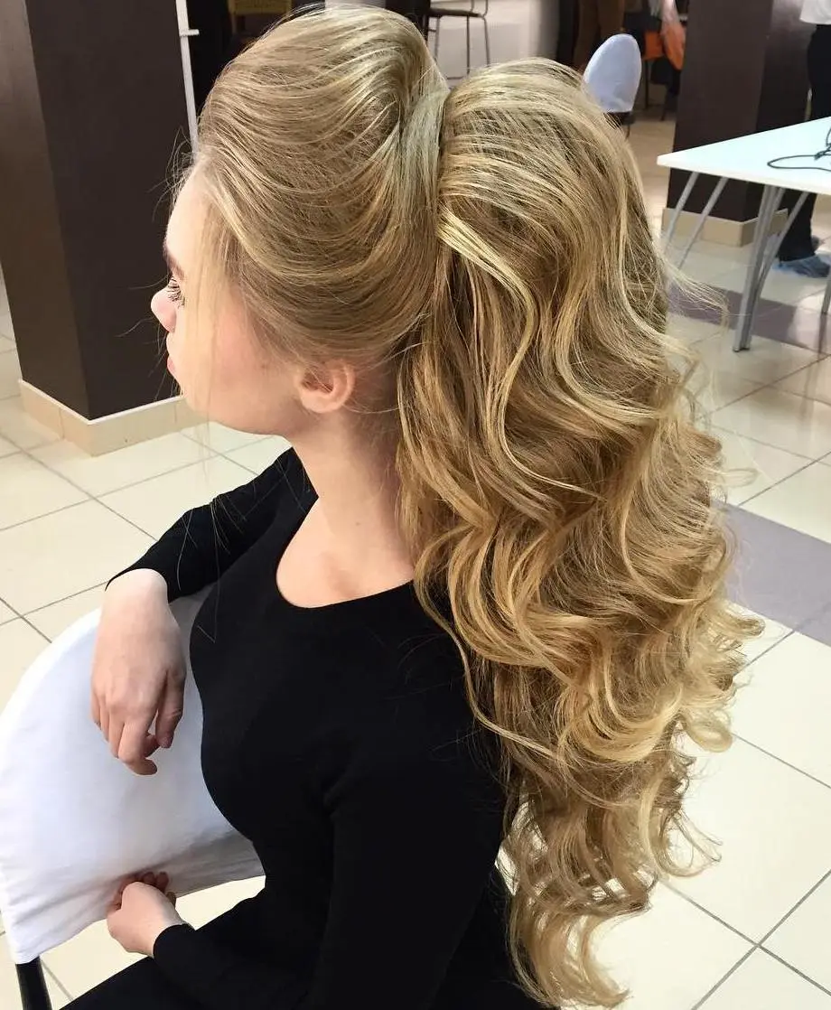 Woman in black round neck top with Extra Long Double Ponytail - hairstyles cut for long hair
