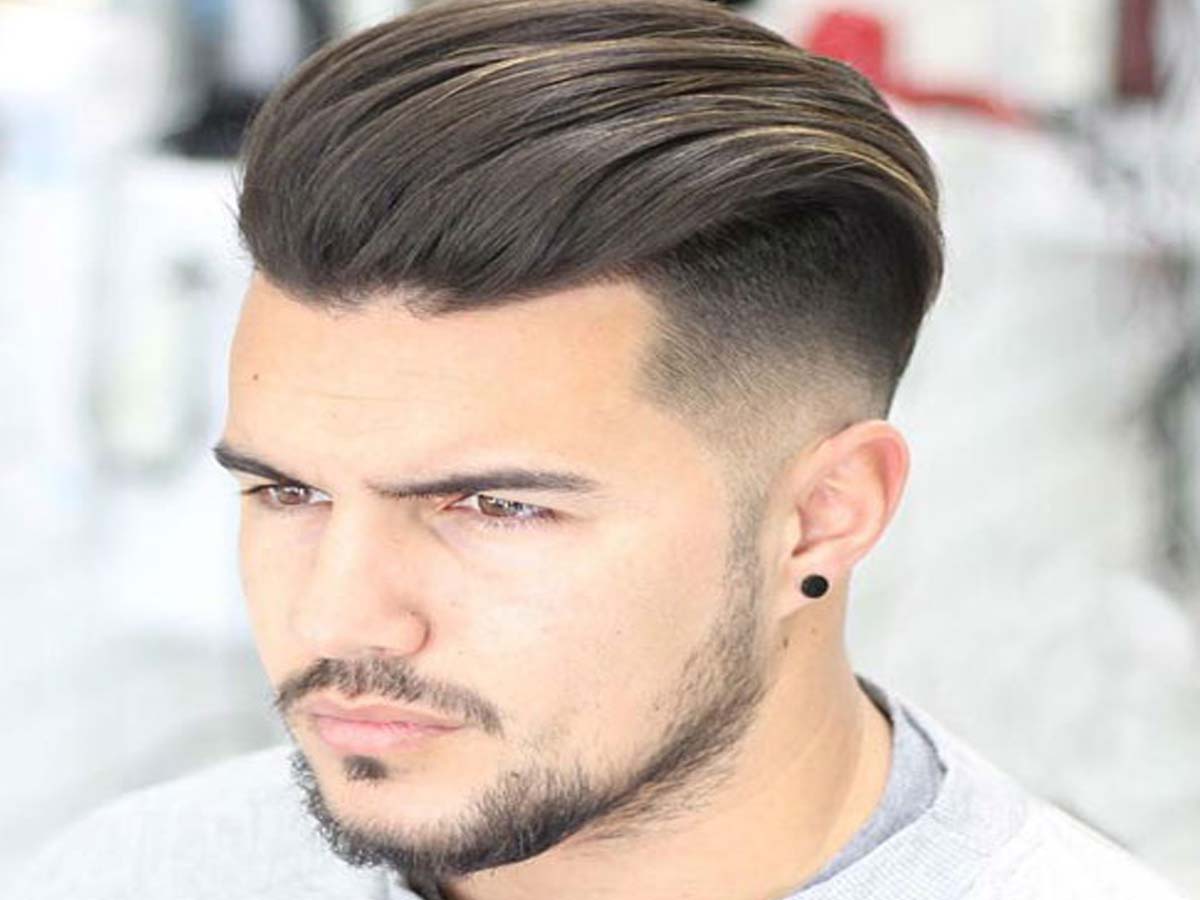 9. Blonde Faux Hawk Hairstyles for Men - wide 3