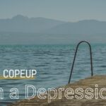 CopeUp with Depression - Girl sitting lonely in unknown place