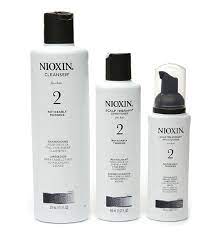Nioxin Postpartum Shampoo - Photo of 3 bottles