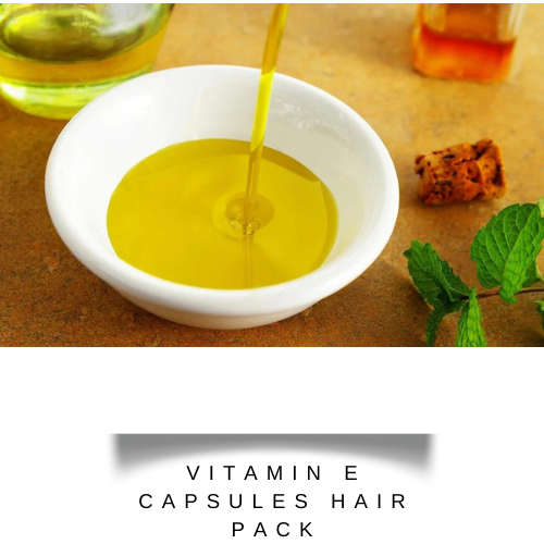 olive oil mixed with vitamin e capsules in a white bowl - hair fall control mask