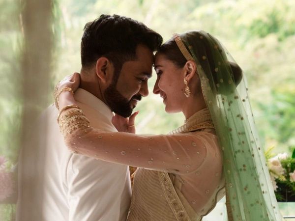 Ali Abbas Zafar and Alicia looking at each other and posing - indian celebrity marriage