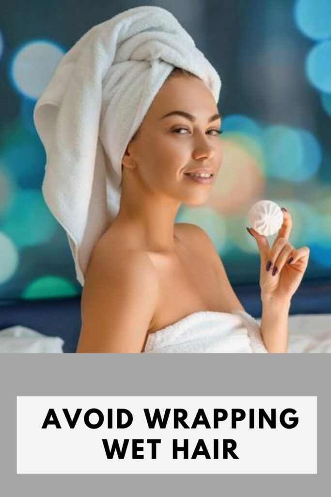 A women is smiling with wrapping wet hair with towel - how to grow hair faster in a week at home