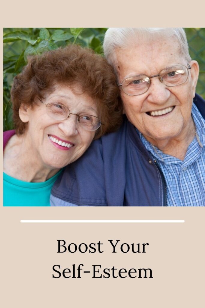 An old couple smiling and hugging each other - Dentures Can Improve Quality of Life