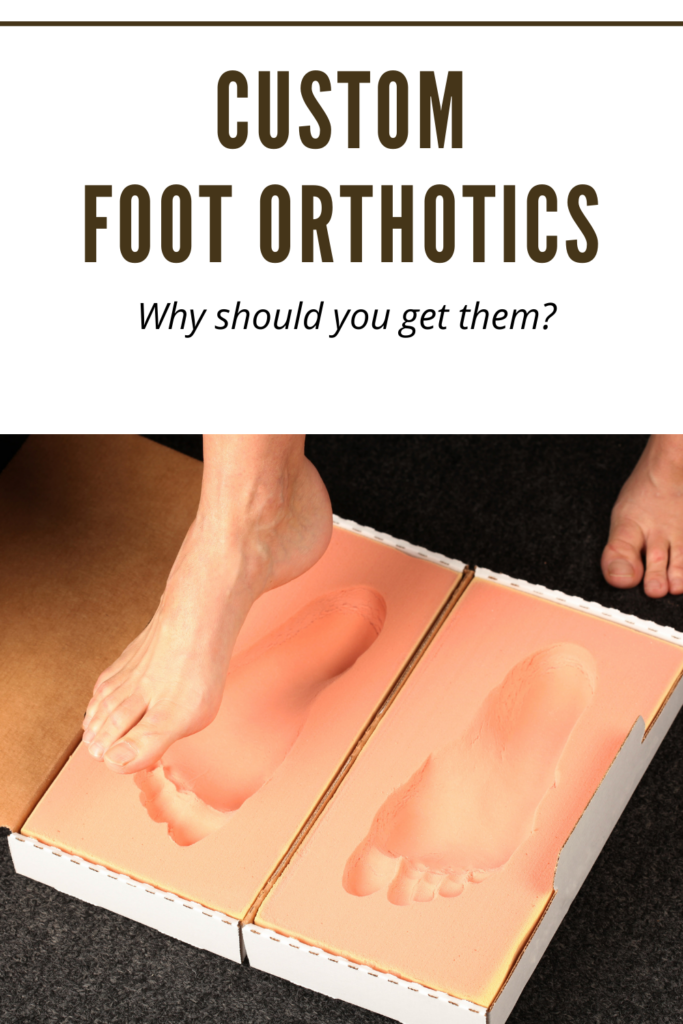 Custom foot orthotics - a person is trying to check his foot size in orange colored feet map