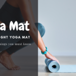 woman is folding her blue color yoga mat - yoga mats