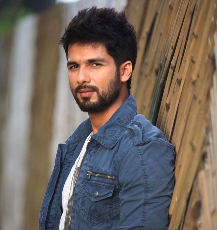 Shahid kapoor in blue denim jacket giving a side pose and showing his short spikes hairstyle - Shahid Kapoor latest Hairstyle