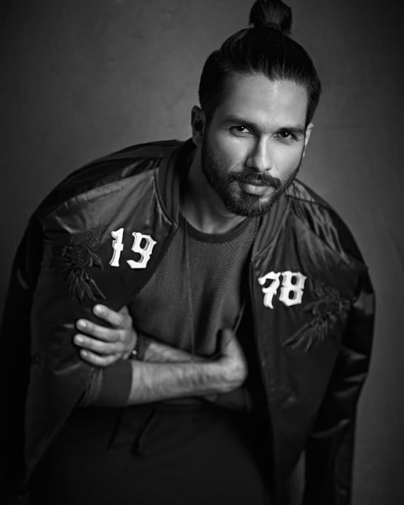 Shahid kapoor in black leather jacket with the man bun hairstyle - shahid kapoor hairstyles name