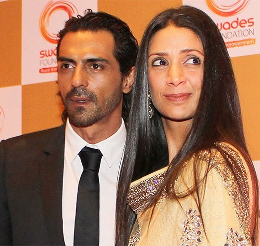 Arjun Rampal and his ex-wife  Mehr Jesia posing for camera - bollywood actress divorce list