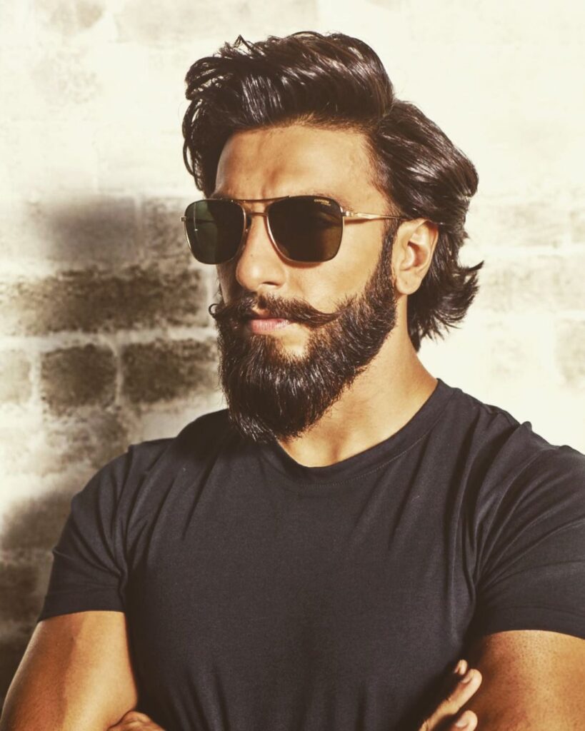 Ranveer Singh in goggles flaunting his beard with Messy Bouffant - Ranveer Singh Latest hairstyles