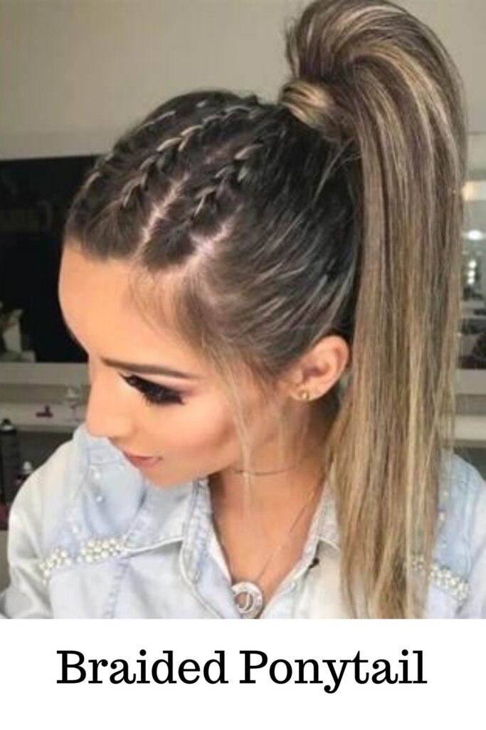 a girl is showing her Braided Ponytail - ponytail hairstyles for wedding