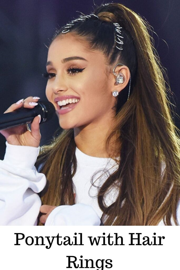 smiling Ariana Grande singing and showing her Ponytail with hair rings - simple ponytail hairstyles for everyday