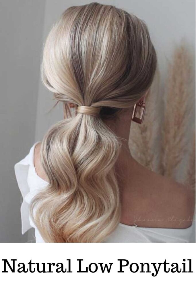 A lady in blonde hair showing her natural low ponytail - ponytail hairstyles for everyday,